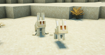 Golden rabbits in a desert.