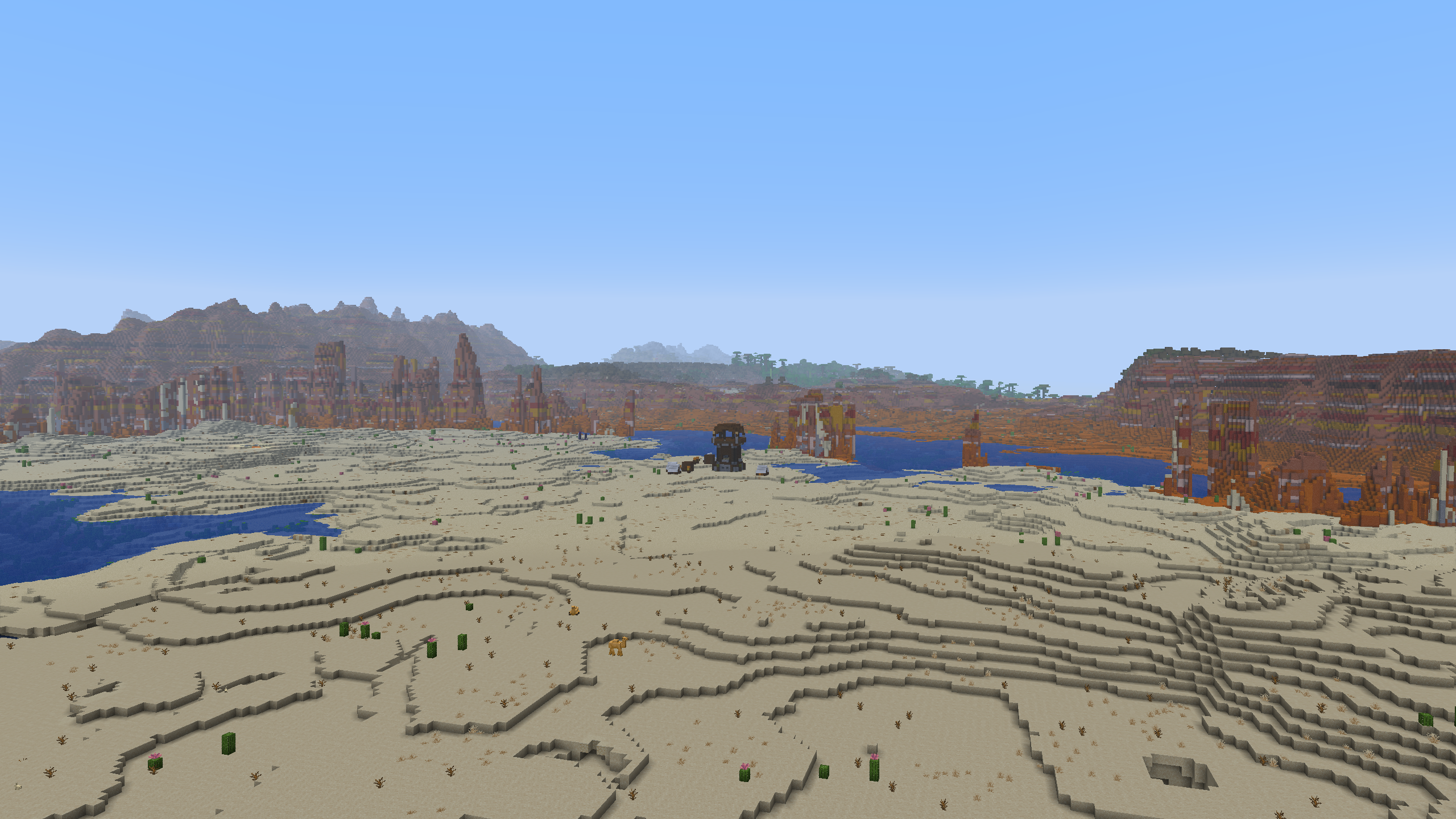 A flat Desert biome with a photogenic Badlands in the background
