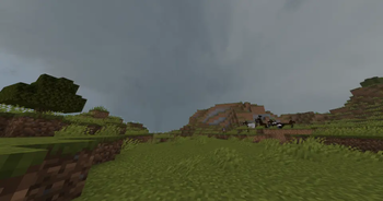 A tornado seen through two hills
