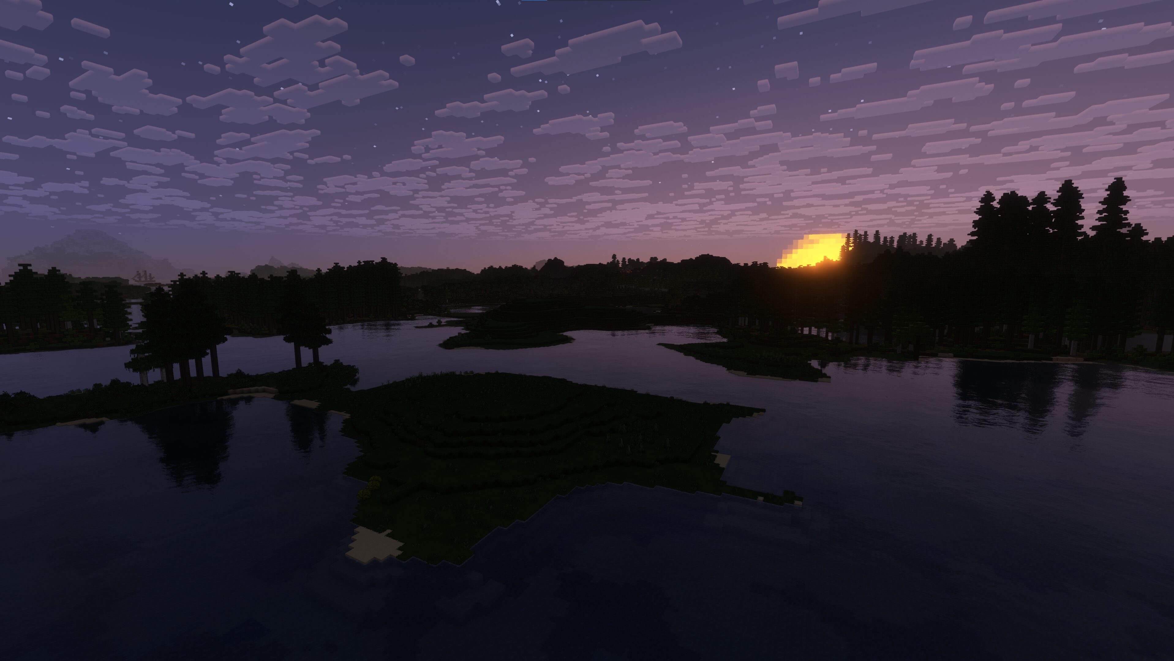 Night approaches on a lake.