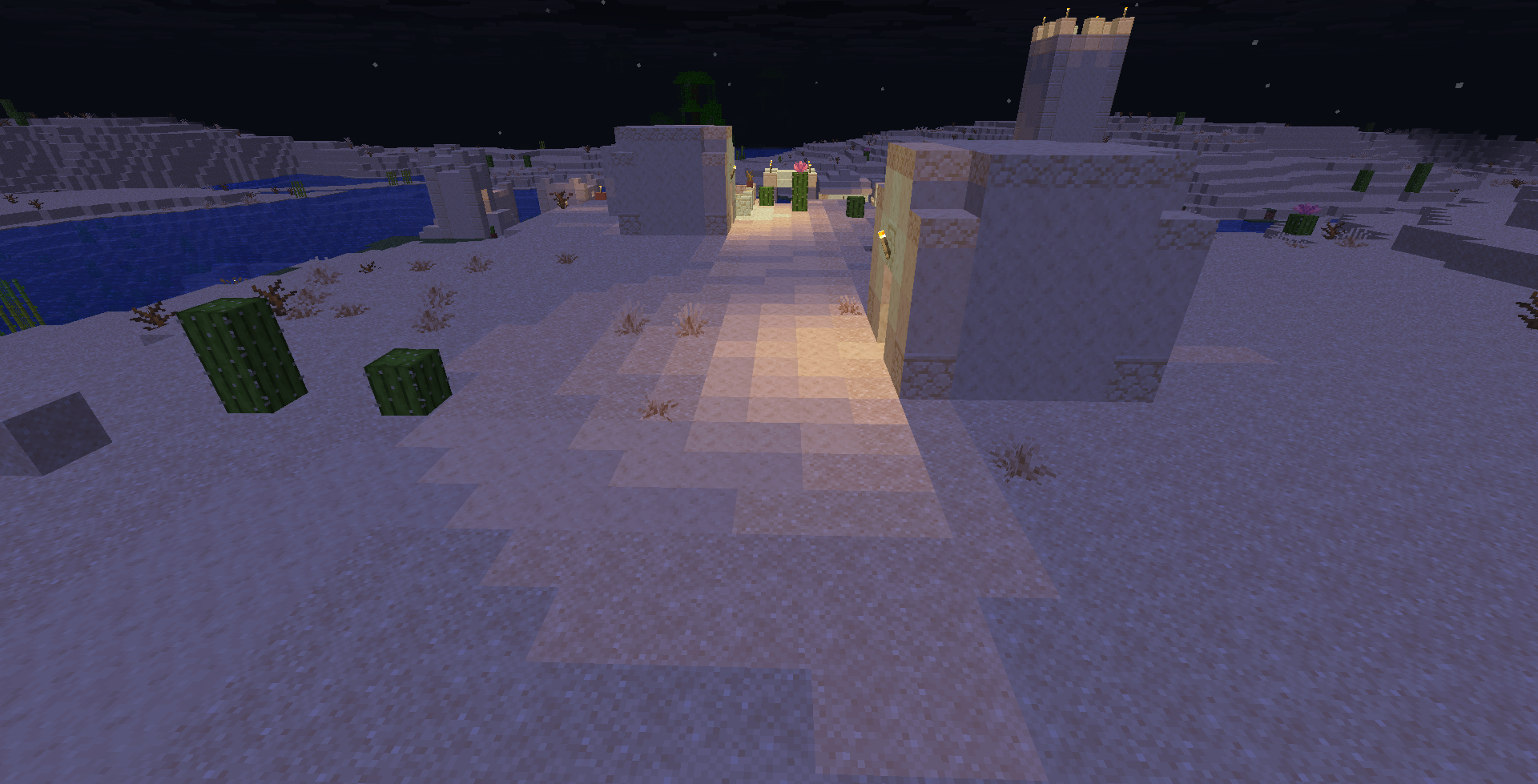 torches lighting circular areas with villager's houses walls casting shadows from them