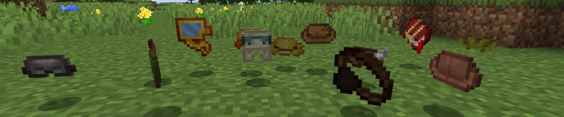 Hat items scattered on a grassy plain