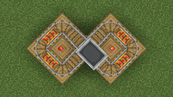 A rail intersection being a single Rail block in the new "intersection" shape. Here, a minecart rides in a loop passing it constantly.